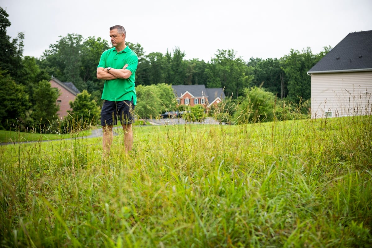 landscaping customer considering an empty front yard