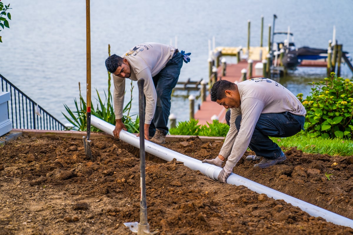 crew team digging drainage pipe 1