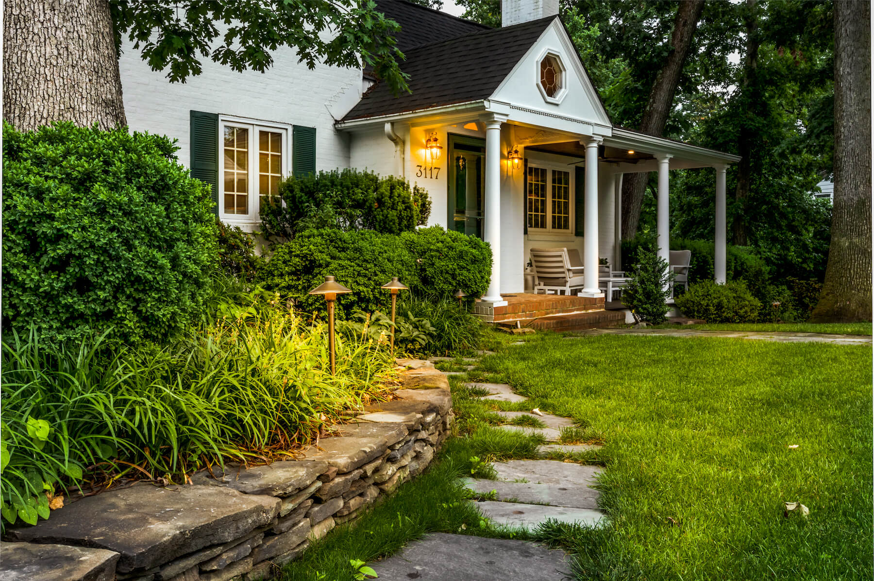 stone retaining wall stepping stones landscape lighting